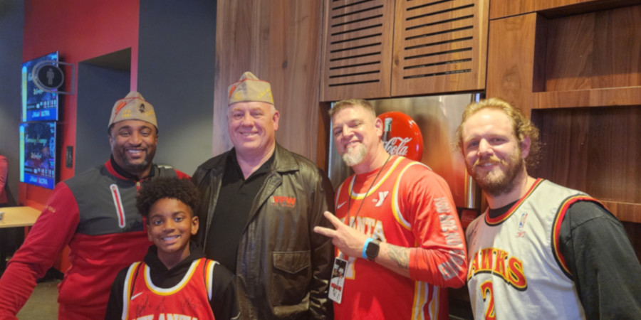 Comrades and family members of Georgia VFW take a break from the fun and entertainment of Crowning Courage event to gather for a group photo.