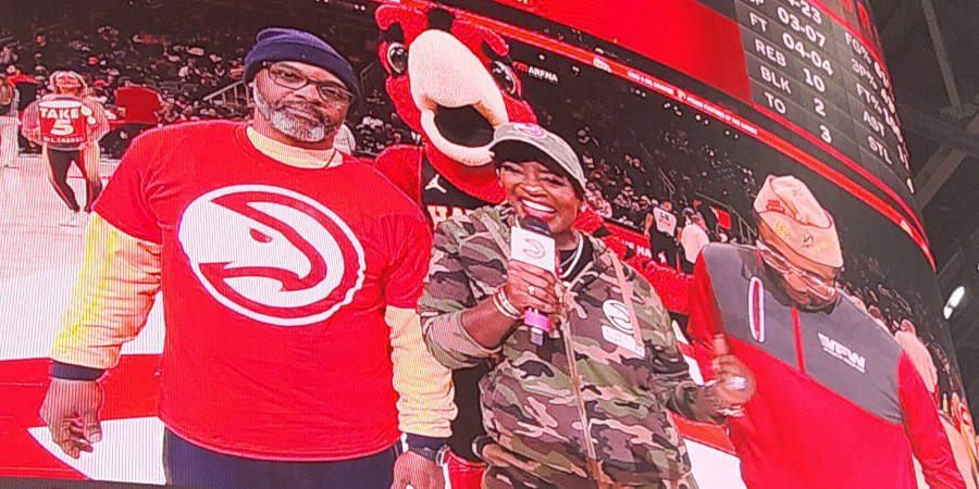 Georgia VFW leader, Sherrod Conyers, competes with fellow veteran during timeout at Atlanta Hawks game