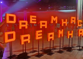 State Jr Vice Commander Sherrod Conyers stands in front of the DreamHack Atlanta 2025 sign.